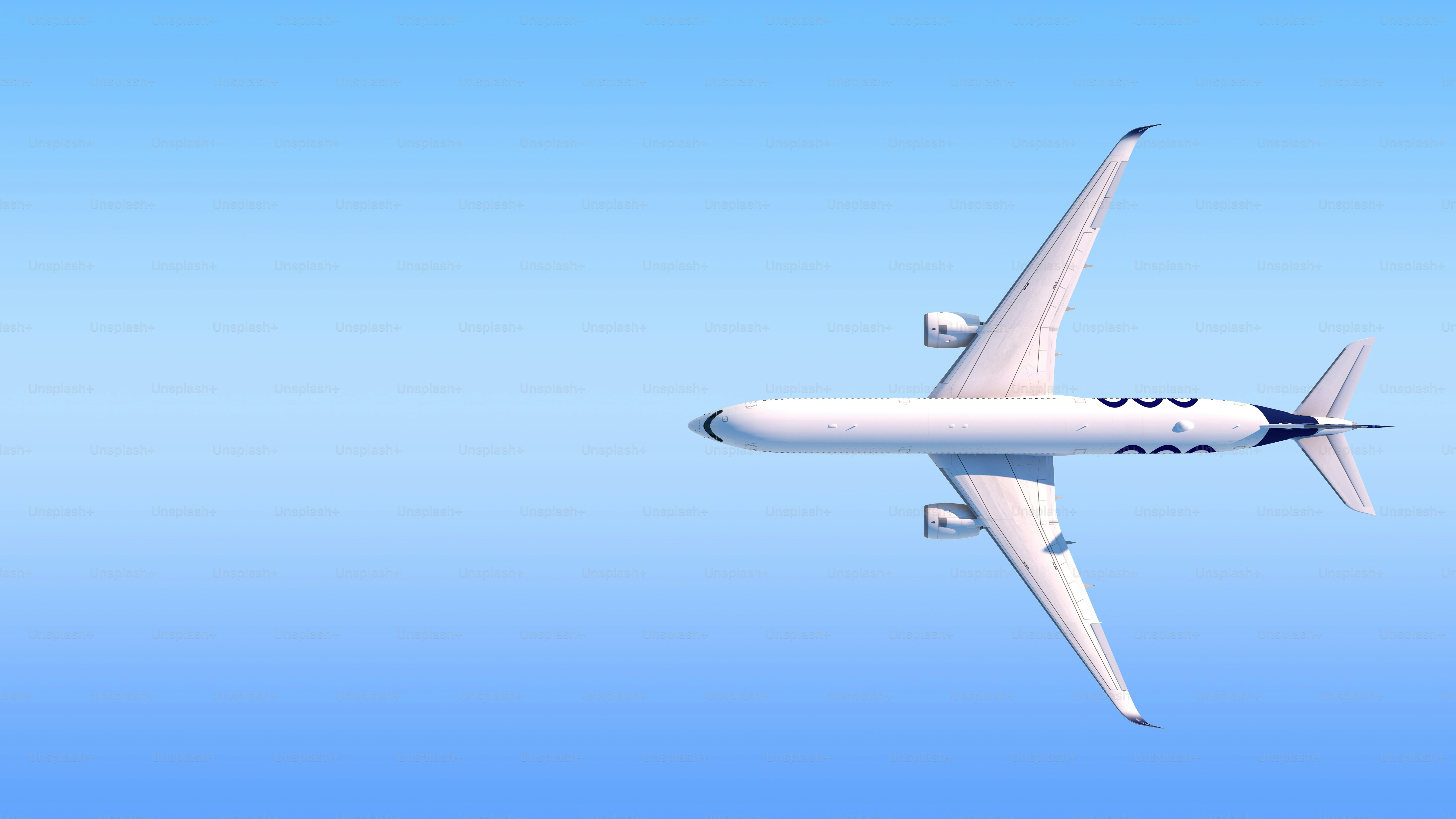 a large passenger jet flying through a blue sky